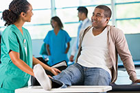 physical-therapist-helping-patient-with-injury-in-rehabilitation-hospital