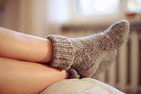 Feet inside Warm Wool Socks